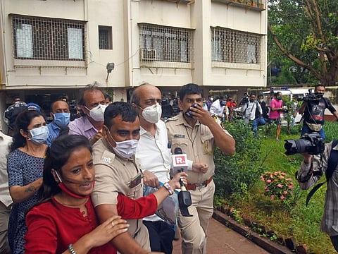 Actress Rhea Chakraborty's father Indrajit Chakraborty taken by Police from Rhea's residence at Santacruz, in Mumbai