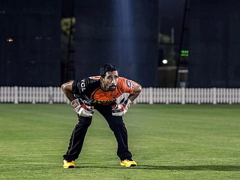 Wriddhiman Saha takes up his familiar position during practice at the ICC Academy ground earlier this week.
