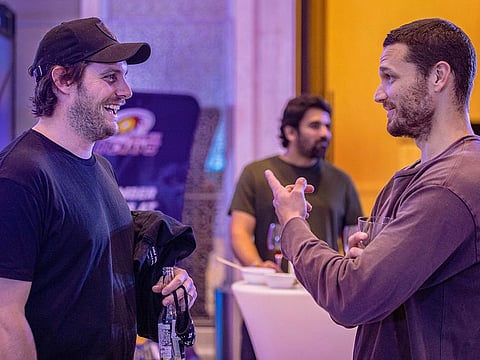 Mumbai Indians' Mitchell McClenaghan and Nathan Coulter-Nile relax at the St Regis hotel in Abu Dhabi