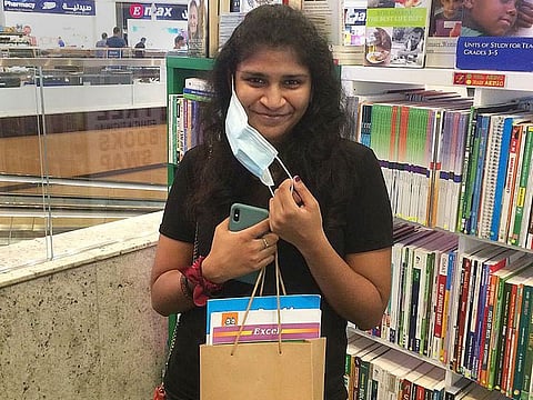 A resident at the book swap platform at the Oasis Mall