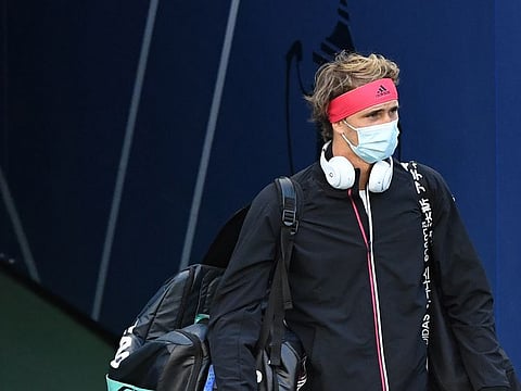 Alexander Zverev of Germany finally walks on to the court for his US Open match against Adrian Mannarino of France