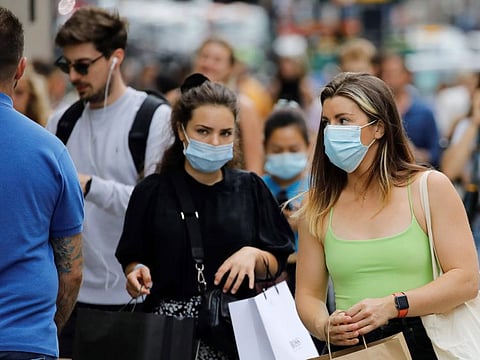 In malls and public places, men can often be seen without masks.