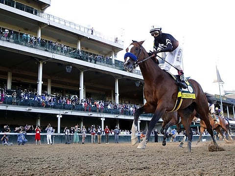 Authentic, ridden by jockey John Velazquez, crosses the finish line in front of Tiz The Law to win the 146th running of the Kentucky Derby.