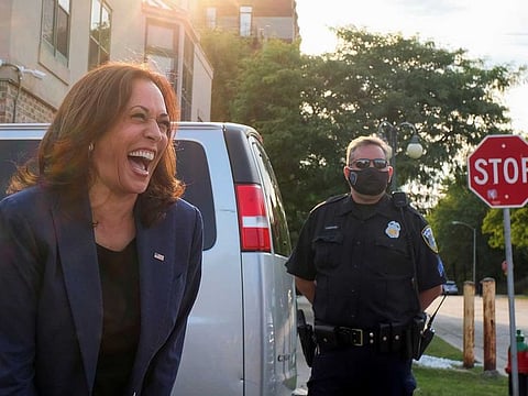 Democratic US vice-presidential nominee Kamala Harris reacts to a cheering crowd of supporters while she visits a "Build Back Better" roundtable with Black Milwaukee business owners to discuss how a Biden-Harris administration would advance racial equity as part of our nation's economic recovery, in Milwaukee, Wisconsin, US, September 7, 2020.