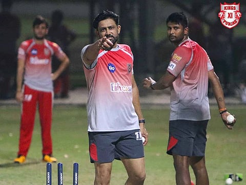 Anil Kumble, the chief coach of Kings XI Punjab, in the thick of action during their training session in Dubai.