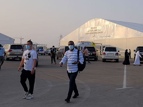 Residents leaving the Ghantoot rapid testing facility on Dubai-Abu Dhabi border after their screening