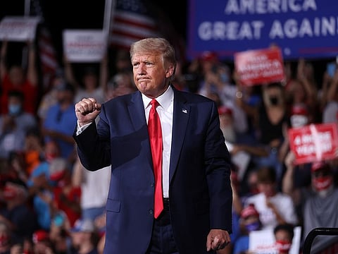 US President Donald Trump concludes a campaign rally at Smith Reynolds Regional Airport in Winston-Salem, North Carolina, U.S., September 8, 2020.
