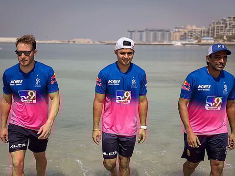Rajasthan Royals trio of David Miller (from left), Riyan Parag and Robin Uthappa walk back after their spectacular shirt launch.