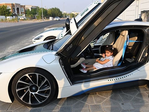 The three-year-old girl in the luxury police patrol