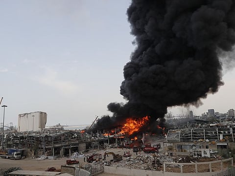 Smoke rises from the port in Beirut on September 10, 2020, from a huge fire five weeks after a massive blast killed nearly 200 people and destroyed parts of Lebanon's capital.