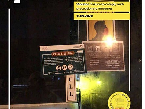 One cafe in Karama has been shut down while seven shops in different malls have been fined for violating the COVID-19 guidelines.