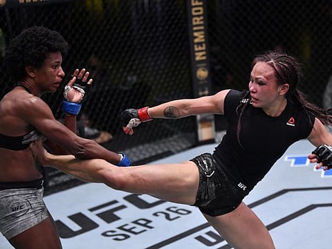 A bruised Michelle Waterson defeated Angela Hill