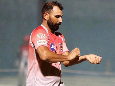 Mohammad Shami makes use of body sweat, with the ban on saliva, to keep the shine on the white ball during practice in Dubai.