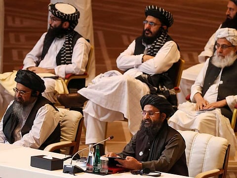 Taliban co-founder Mullah Abdul Ghani Baradar speaks during the opening session of the peace talks between the Afghan government and the Taliban in the Qatari capital Doha on September 12, 2020.