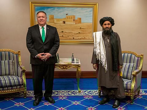 US Secretary of State Mike Pompeomet with the Taliban’s deputy leader Mullah Abdul Ghani Baradar recently