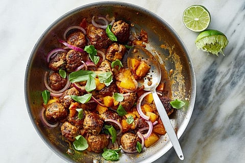 Skillet meatballs with peaches, basil and lime.