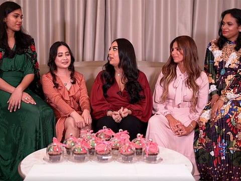 Arwa Beig (centre) with some frontline health care workers.