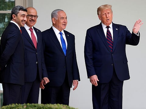 Sheikh Abdullah Bin Zayed, UAE Minister of Foreign Affairs and International Cooperation with President Donald Trump, Bahrain's Foreign Minister Abdullatif Al Zayani and Israel's Prime Minister Benjamin Netanyahu as they stand together on the West Wing colonnade before the signing of the Abraham Accords, normalising relations between Israel and some of its Middle East neighbours, on the South Lawn of the White House in Washington, US.