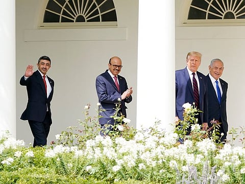 President Donald Trump walks to the Abraham Accords signing ceremony at the White in Washington with Israeli Prime Minister Benjamin Netanyahu, Sheikh Abdullah Bin Zayed Al Nahyan, UAE Minister of Foreign Affairs and International Cooperation, Bahrain Foreign Minister Khalid bin Ahmed Al Khalifa