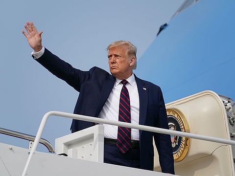US President Donald Trump boards Air Force One at Joint Base Andrews in Maryland, as he travels to Philadelphia to record a town hall event to be televised the same evening, Sept. 15, 2020.