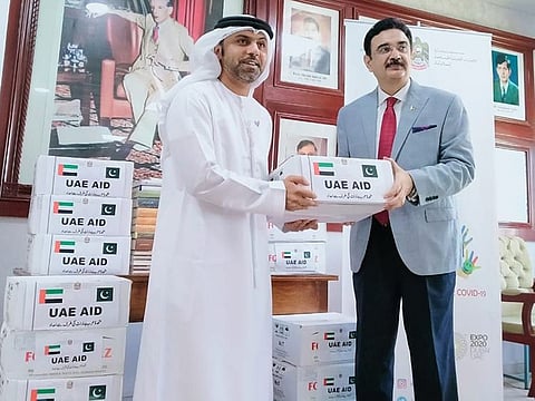 Ambassador of the UAE in Pakistan Hamad Obaid Ibrahim Al-Zaabi with Vice Chancellor of the Quaid-e-Azam University Prof Dr Muhammad Ali at a ceremony marking the handing over of 4,000 bottles of hand sanitizer.