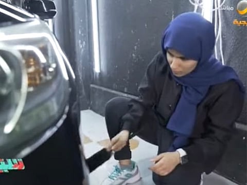 Zahraa Hamadeh, the first Saudi female car polisher.