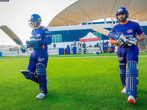 Rohit Sharma, right, and Quinton De Kock prepare to open the batting for Mumbai Indians during a practice match