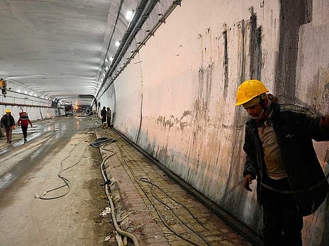 Labourers work inside the Atal Rohtang Tunnel in Himachal Pradesh state on September 1, 2020.