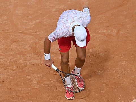 Novak Djokovic smashes his racket in the Italian Open