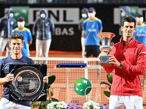 Serbia's Novak Đjoković (right) celebrates after winning the final over Argentina's Diego Sebastián Schwartzman at the Italian Open on Monday.