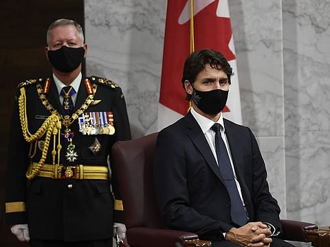 Justin Trudeau, Canada's prime minister, right, and General Jonathan Vance, chief of defence, listen during the Throne Speech on Parliament Hill in Ottawa, Ontario, Canada, on Wednesday, Sept. 23, 2020.