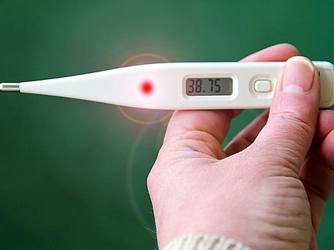 Photo for illustrative purposesBody aches, sore throat, fever, cough, shortness of breath, fatigue and headaches are symptoms shared by COVID-19 and flu.