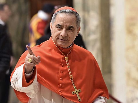 In this file photo taken on June 28, 2018, newly elevated cardinal, Giovanni Angelo Becciu from Italy, attends the courtesy visit of relatives following a consistory for the creation of new cardinals on June 28, 2018 in the Apostolic Palace at St Peter's basilica in Vatican. Cardinal Angelo Becciu, the head of the vatican's saint-making office, resigned, the Vatican said in a statement on September 24, 2020.