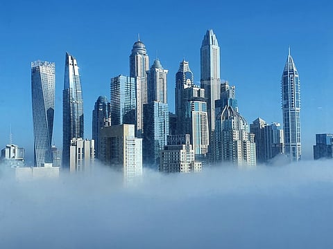 Morning fog at Jumeirah Lakes Tower Dubai