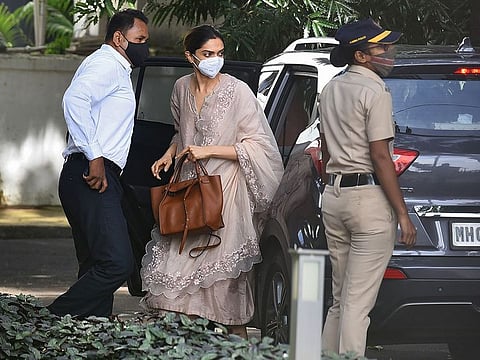 Bollywood actress Deepika Padukone arrives to attend questioning by Narcotics Control Bureau (NCB) officials in September, in Mumbai.