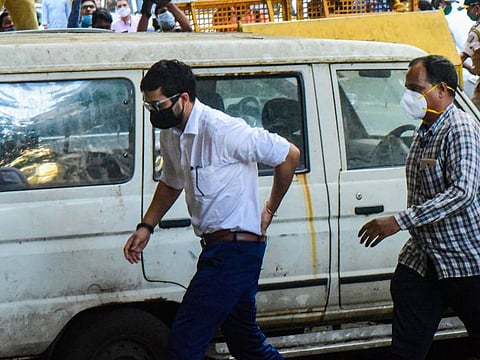 Executive producer Kshitij Ravi Prasad, arrested by the Narcotics Control Bureau in a drugs case linked to the death of actor Sushant Singh Rajput, being taken away after his medical tests, in Mumbai, Saturday, Sept 26, 2020.