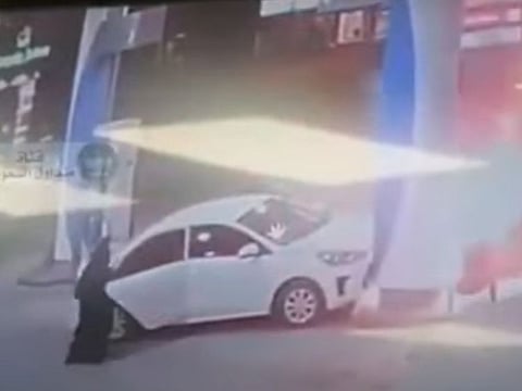 A screengrab from the video show the car after it crashed into the petrol pump in Saudi Arabia.