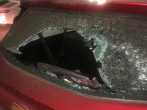 The window smashed during the attack.