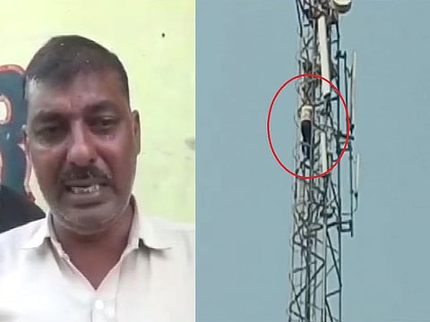 Man climbs up mobile tower in UP after an argument with his wife