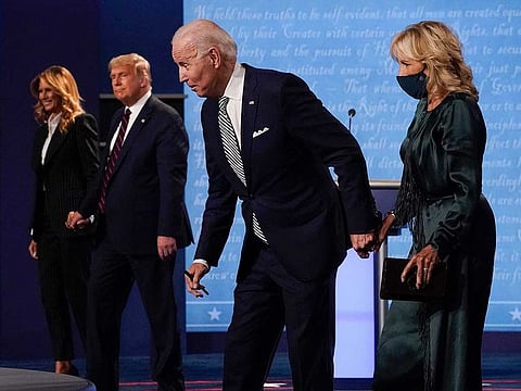 From l-r, first lady Melania Trump, President Donald Trump, Democratic presidential candidate former Vice President Joe Biden and Jill Biden, walk off stage at the conclusion of the first presidential debate Tuesday, Sept. 29, 2020, at Case Western University and Cleveland Clinic, in Cleveland, Ohio.