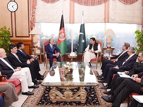 Dr. Abdullah Abdullah (left) chairman of Afghanistan's High Council for National Reconciliation meets with Pakistan Prime Minister Imran Khan in Islamabad.