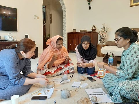 Expat women crafting prostheses for breast cancer survivors