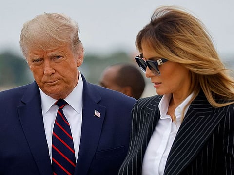 US President Donald Trump and first lady Melania Trump arrive at Cleveland Hopkins International Airport to participate in the first presidential debate with Democratic presidential nominee Joe Biden in Cleveland, Ohio, U.S., September 29, 2020.