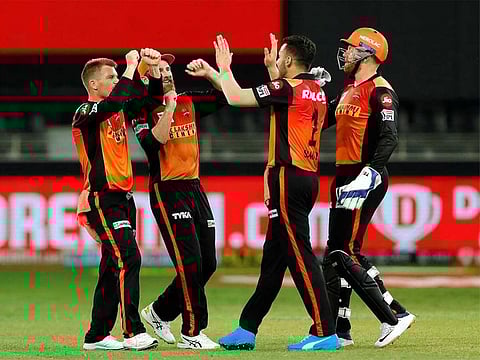 Sunrisers Hyderabad players rejoice at the fall of Kedar Jadhav in the IPL 2020 match against the Chennai Super Kings at the Dubai International Stadium on Friday.