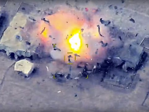 In this photo taken from video released by the Azerbaijan's Defence Ministry on Friday, October 2, 2020, Azerbaijan's forces attack Armenian army's camp during fighting in the self-proclaimed Republic of Nagorno-Karabakh, Azerbaijan.