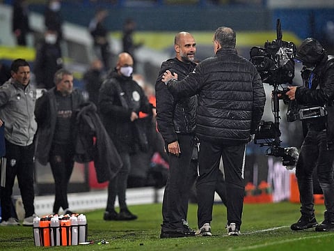 Manchester City's Pep Guardiola with Leeds boss Marcelo Bielsa