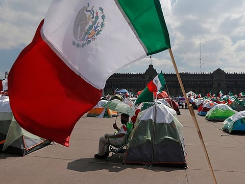 Mexicans protest to demand the resignation of President Andres Manuel Lopez Obrador in Mexico City on Sunday, October 4, 2020.