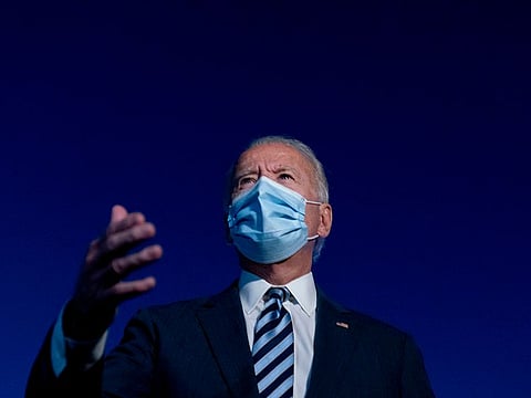 Democratic presidential candidate Joe Biden speaks to members of the media before boarding his campaign plane at Hagerstown Regional Airport in Hagerstown, Maryland on Tuesday, October 6, 2020.