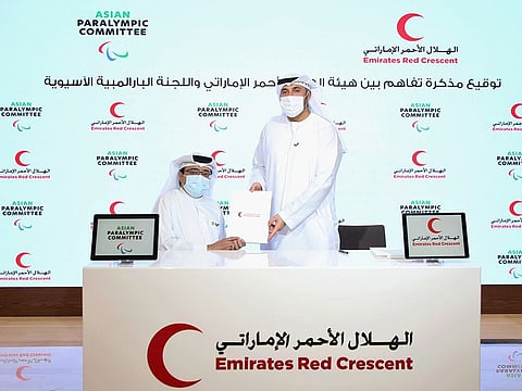 Majid Rashid Al Usaimi, President of Asian Paralympic body, (left) at the signing of the MoU with Emirates Red Crescent.