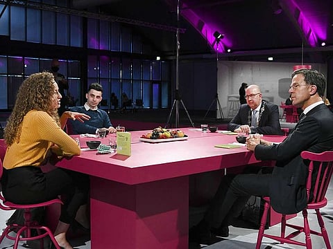 Dutch Prime Minister Mark Rutte (R) talks to people from Brabant who have been affected by the COVID-19 in various ways in Den Bosch, The Netherlands, on October 6, 2020.